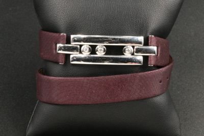 purple leather cuff bracelet with silver plated clasp on a mannequin mannequin mannequin mannequin mannequin mannequin mannequin