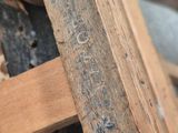a close up of a piece of wood on a table