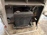 a small air conditioner in the back of a camper