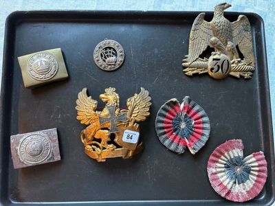 a tray with a tray of badges and badges on it