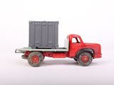 a toy truck with a container on the back of it