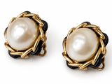 an image of a pair of pearl earrings on a white background