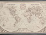 an old map of the world is shown in a black frame