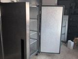 an image of a kitchen with a refrigerator and a freezer