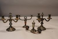Deux paires de candélabres en métal argenté : l'une de style…