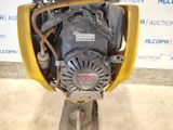 a small engine that is sitting on a stand