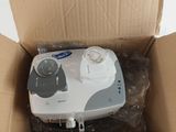a box that has a machine in it inside of it