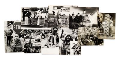 several old black and white photos of people holding up signs