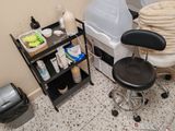 an image of a room with a chair and a table