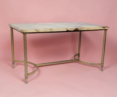 an image of a marble top table on a pink background