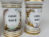 three vases that have been decorated with gold and white designs