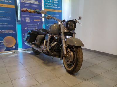 a motorcycle that is parked in a showroom