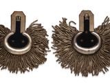 pair of silver and black earrings with fringes on a white background