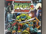 a nintendo game case with the cover of teenage mutant turtles 2