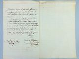 a close up of a piece of paper with writing on it