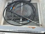 a hose that is connected to a water heater
