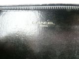 an image of a black purse with a gold logo on it