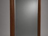 an image of a mirror with a greek design on it