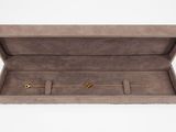 an open box with three rings inside of it