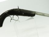 a gun that is sitting on top of a table