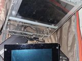 a laptop and a monitor in a piece of luggage