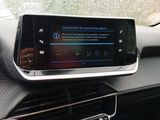 the dashboard of a car with a display on the dashboard