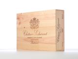 a wooden box that has a bottle of wine in it