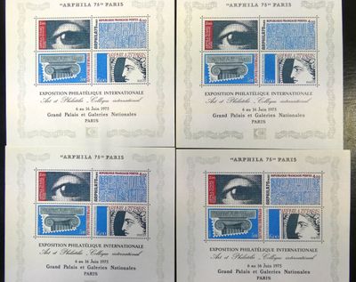 four stamps with a picture of a woman ' s face on them