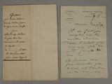 two old papers with handwriting on them sitting on top of a table