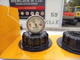 two gauges that are sitting on top of each other