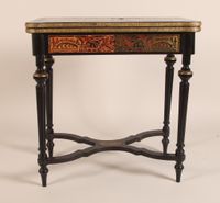 Table à jeux en bois noirci et marqueterie de type Boulle en…