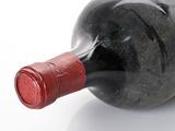a bottle of wine that is sitting on a table