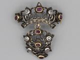 an image of a diamond and ruby broochle