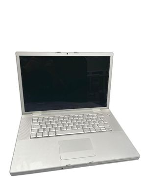 a white laptop with a black screen on a white surface
