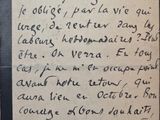 un bout de papier sur lequel est écrit un poème à la main