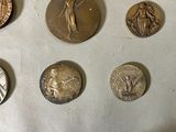 a lot of coins that are on a table