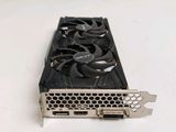 a close up of a video card sitting on top of a table
