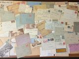 a suitcase full of letters and postcards sitting on a table