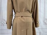the back of a coat on a mannequin mannequin mannequin mannequin mannequin mannequin mannequin mannequin mann
