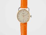 a close up of a wrist watch on a white background