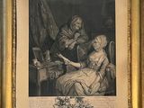 an old picture of a woman sitting at a table next to a man