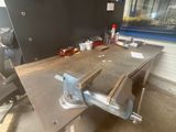 a workbench that is being worked on in the garage