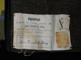 a label on a piece of luggage that says equateur