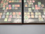 an open book with a lot of different stamps on it
