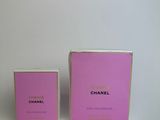 chanel eau de toilette spray and a box of perfume