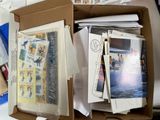 a box full of mail sitting on top of a desk
