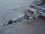 a flat bed trailer with a flat bed attached to it