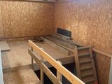 a picture of a room with a ladder in it