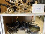 a shelf with a lot of items on top of it