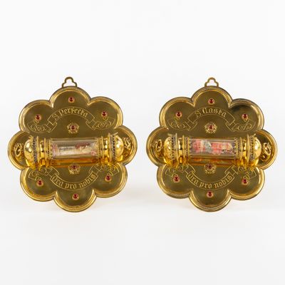 pair of gold plated cufflinks with red and white stones
